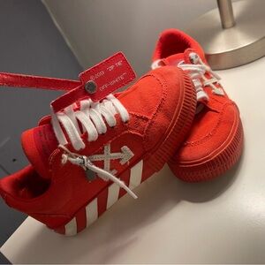 Kids size 28 off white sneakers